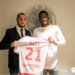 Razak Braimah congratulates Baba Rahman on his Stade Reims move