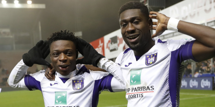 Derrick Luckassen and Jeremy Doku celebrate goal