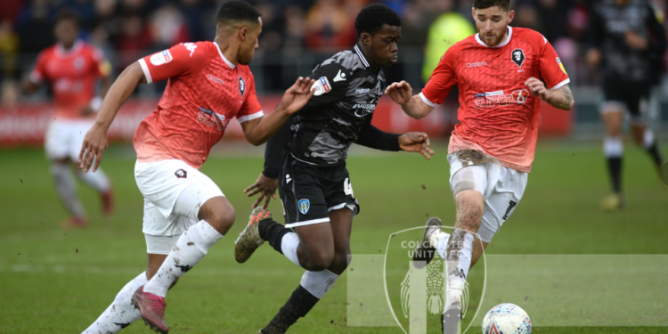 Kwame Poku scores for Colchester United in English League Two win over Thomas Asante’s Salford City