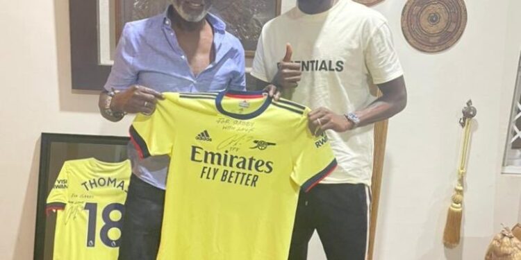 Partey presents jersey to Gabby Otchere Darko