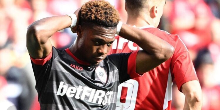 Ghanaian midfielder Christopher Scott reacts to Royal Antwerp big defeat against Standard Liege
