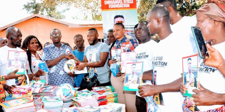 PHILANTROPHIC: Ghana forward Emmanuel Gyasi gifts educational supplies to Pimpimso B.A. KG and Primary School