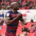 Ghanaian winger Albert Adomah reacts after scoring crucial goal to secure QPR Championship safety