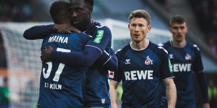 Ghanaian defender Kingsley Schindler reacts to FC Koln victory over Augsburg