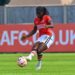 Black Queens coach Nora Häuptle watches Charlton Athletics Freda Ayisi in England