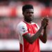 “Extend his contract” – Arsenal fans make U-turn on Thomas Partey after Masterclass performance against Barcelona