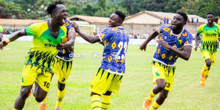 Bibiani Gold Stars coach Michael Osei congratulates players after Kotoko win