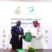 Saudi Arabian Football Federation president Yasser Almisehal congratulates re-elected GFA president Simeon-Okraku