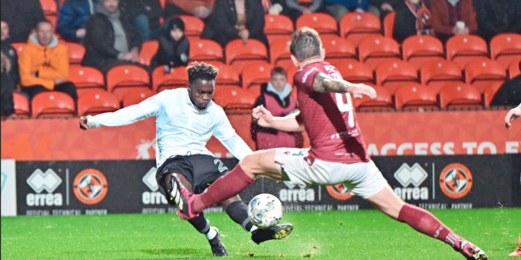 Mathew Anim Cudjoe reacts after scoring for Dundee United against FC Arbroath