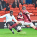 Mathew Anim Cudjoe reacts after scoring for Dundee United against FC Arbroath