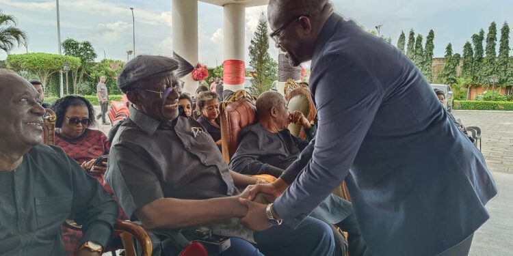 Ex-President John Kufuor congratulates GFA capo Kurt Okraku on re-election