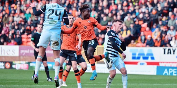 Dundee United coach Jim Goodwin applauds Mathew Anim Cudjoe for outstanding performance in comeback victory against Queens Park