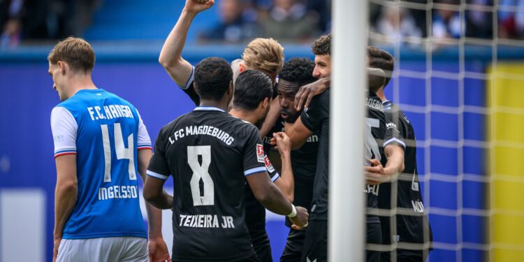 Ghanaian defender Daniel Heber scores to power Magdeburg to victory over Hansa Rostock in Germany