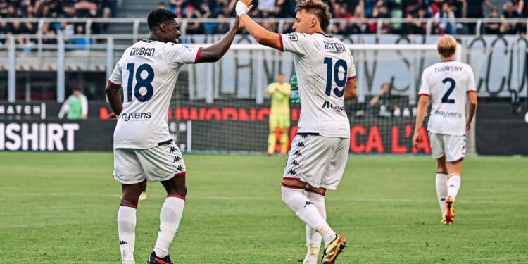 Ghanaian forward Caleb Ekuban scores for Genoa against AC Milan