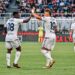 Ghanaian forward Caleb Ekuban scores for Genoa against AC Milan