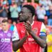 Fleetwood Town captain Brendan Sarpong-Wiredu reacts after Carabao Cup win over Rotherham United 