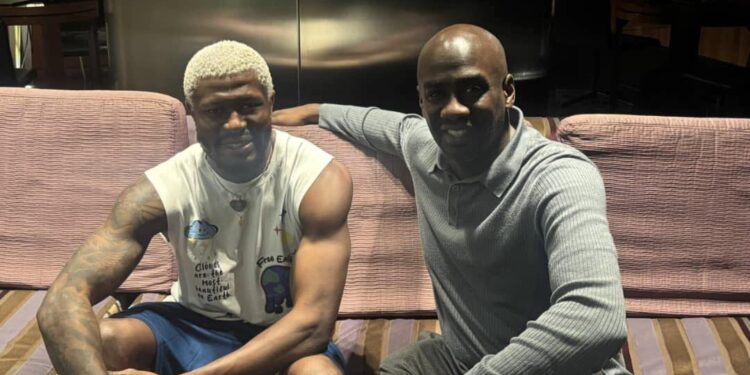 Otto Addo vsists Black Stars midfielder Kwasi Sibo in Spain