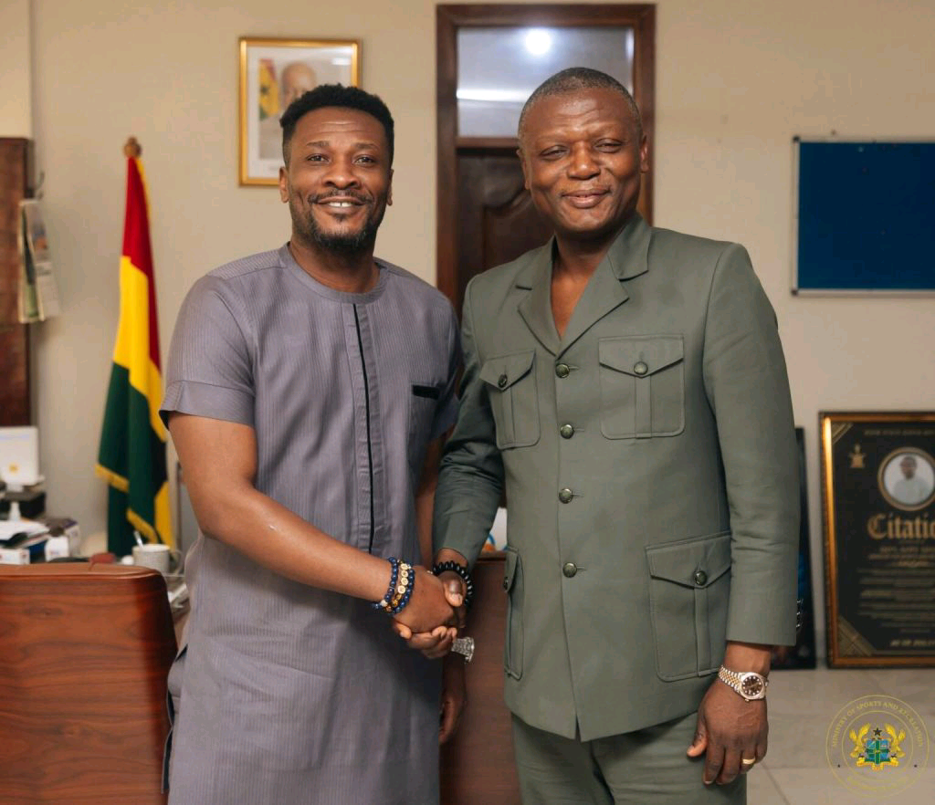 Kofi Adams engages Asamoah Gyan on grassroots football development